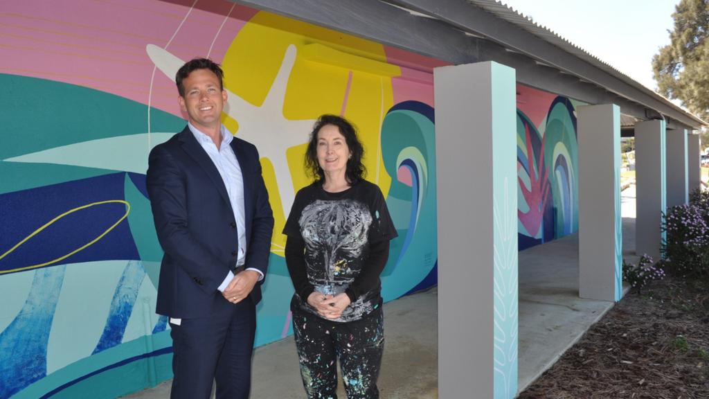Mayor Rhys Williams and artist Sioux Tempestt at the new Falcon Bay mural. Mayor Rhys Williams and artist Sioux Tempestt at the new Falcon Bay mural.